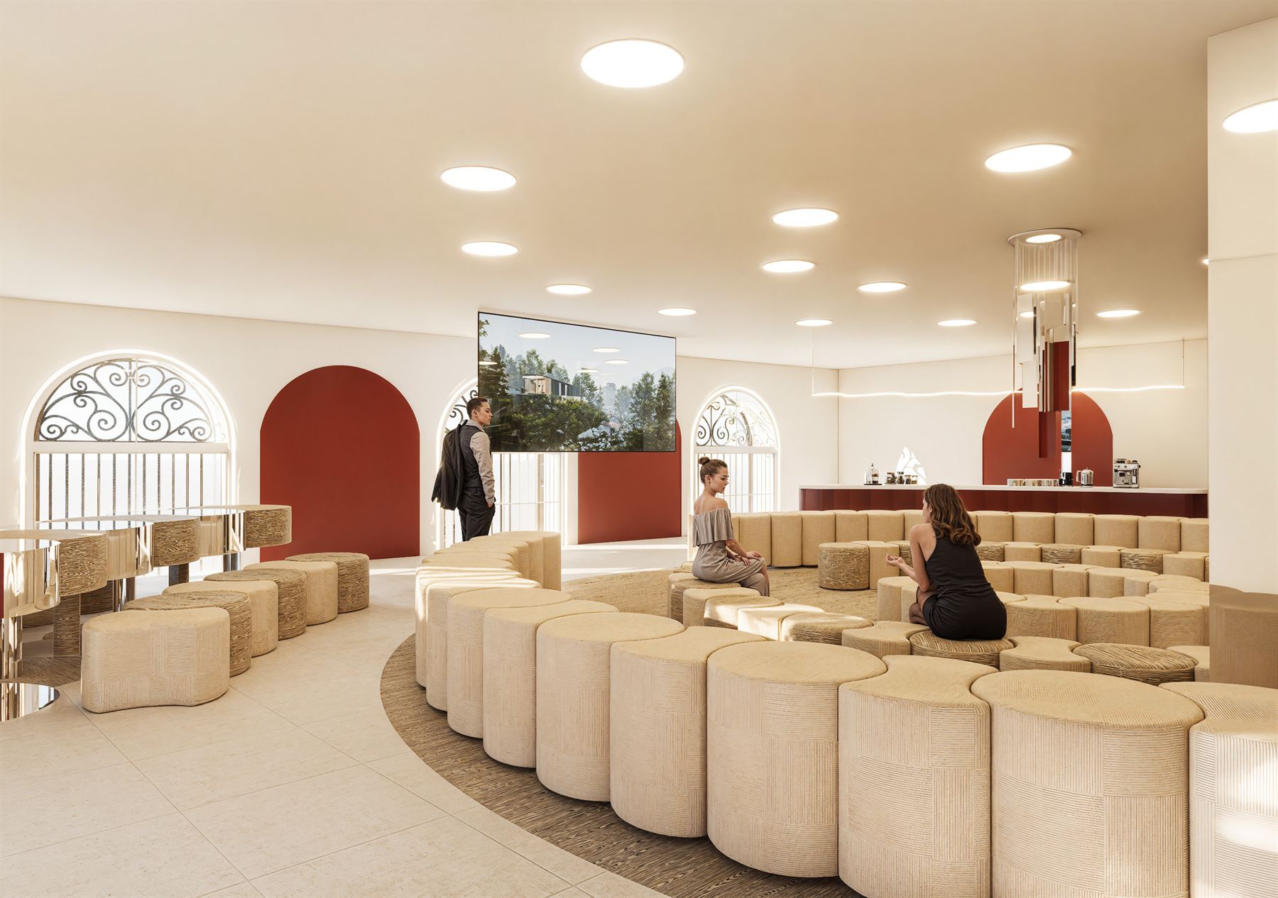 Le salon : assises circulaires disposées en symétrie radiale et espace café